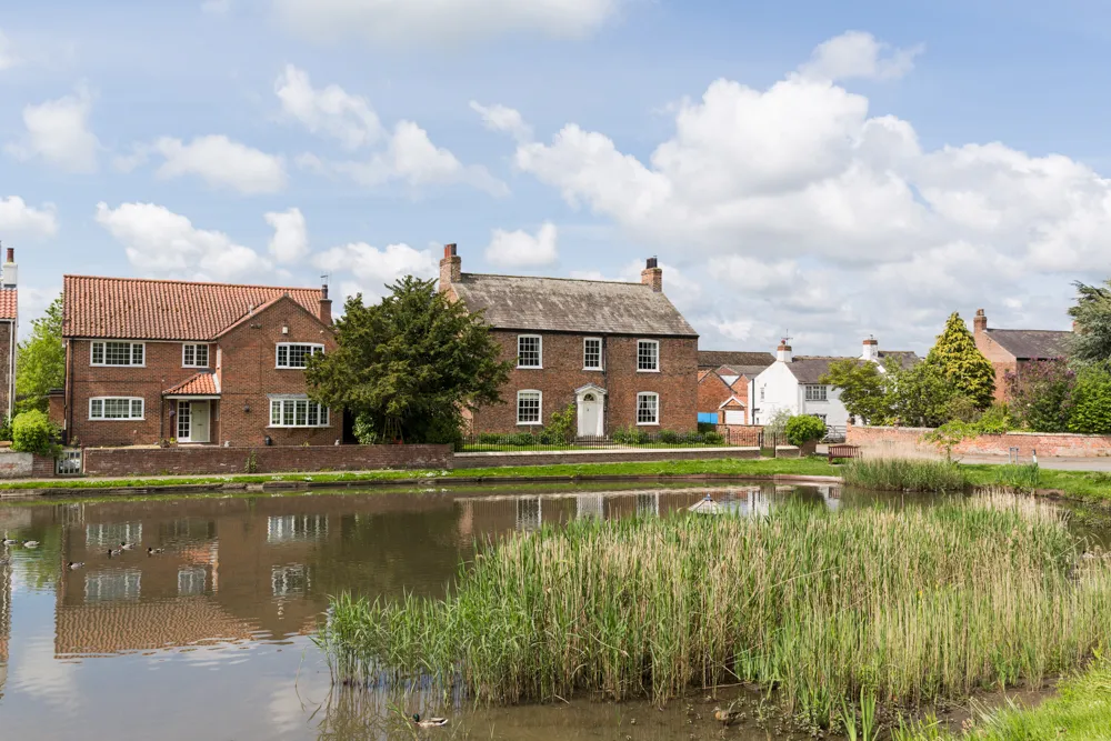 The village duck pond and green beside Prospect House