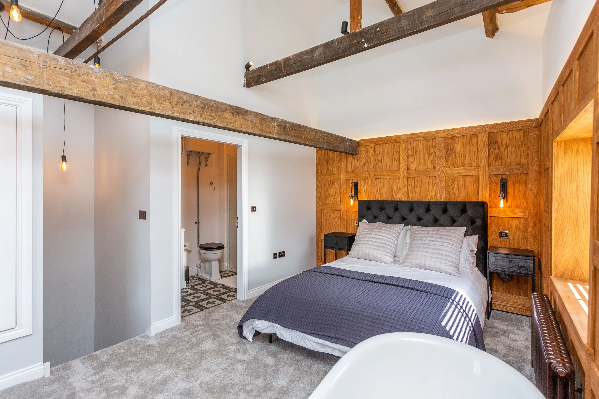 Bedroom with the shower room beyond