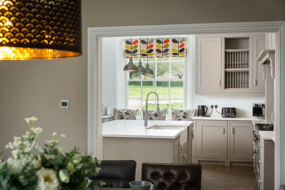 View from the dining room into the kitchen